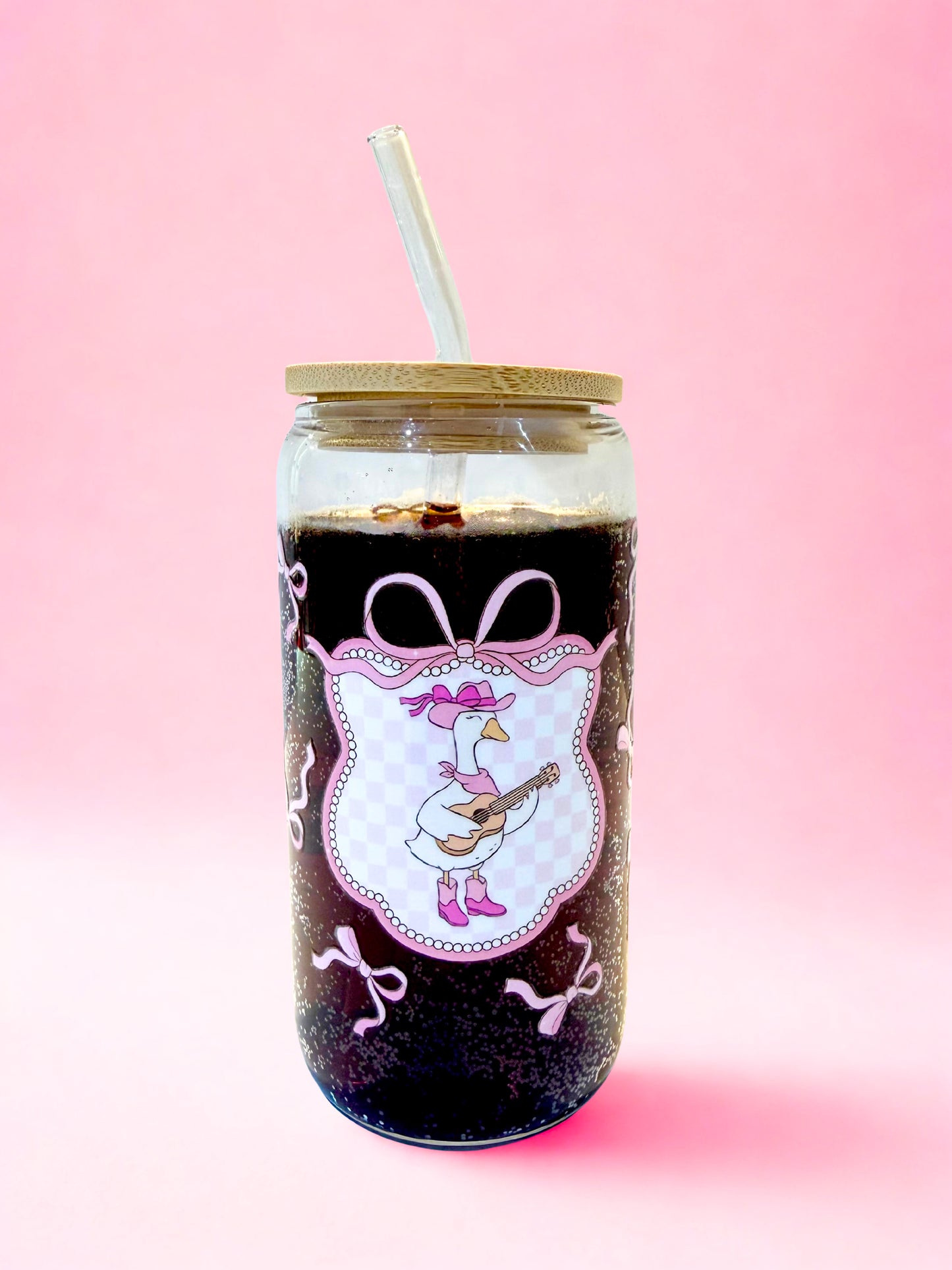 Cowgirl goose glass can cup with pink bow design on pink background