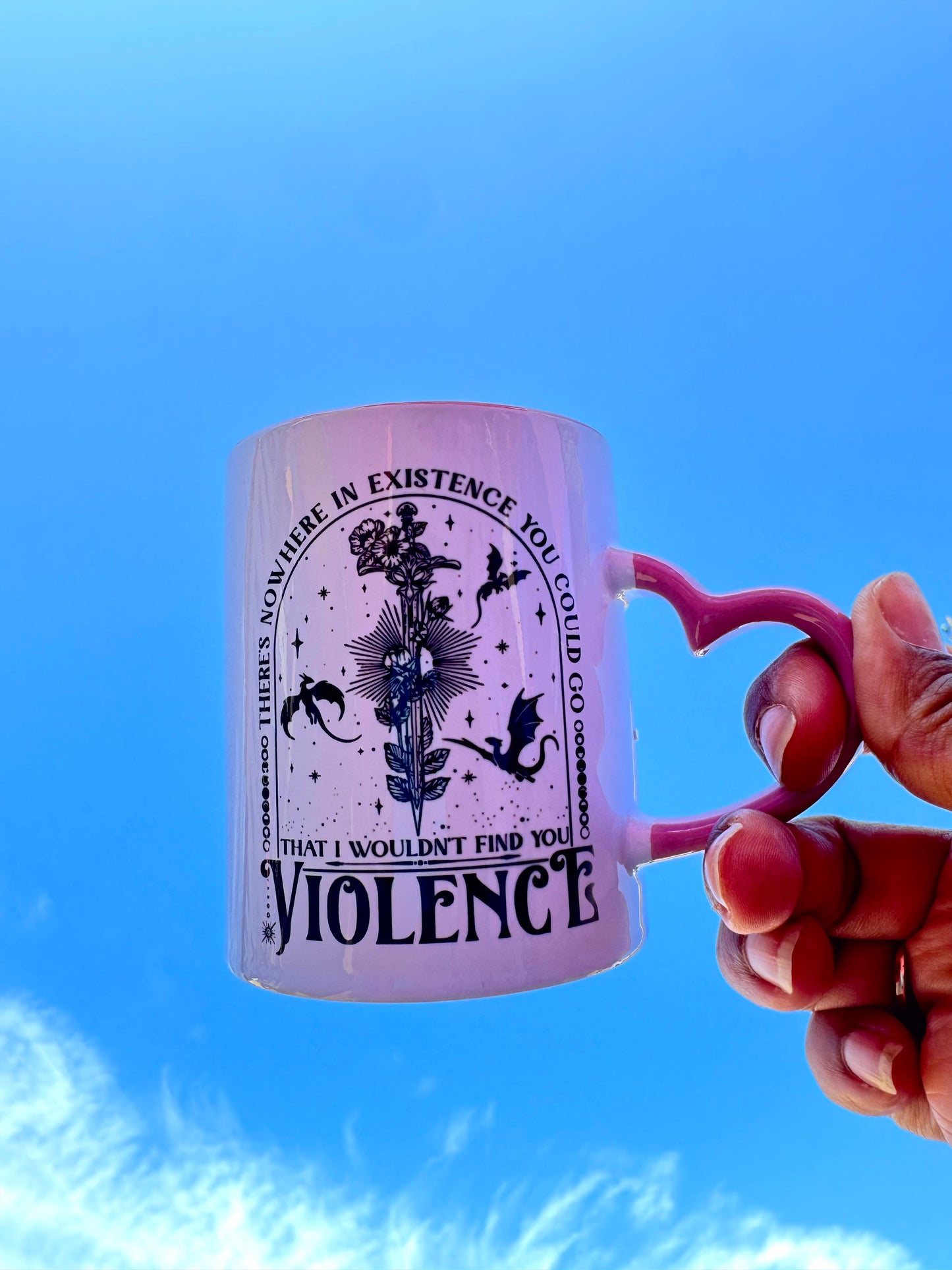 White fantasy mug with pink handle featuring Basgiath War College text and dragon emblem, inspired by Fourth Wing