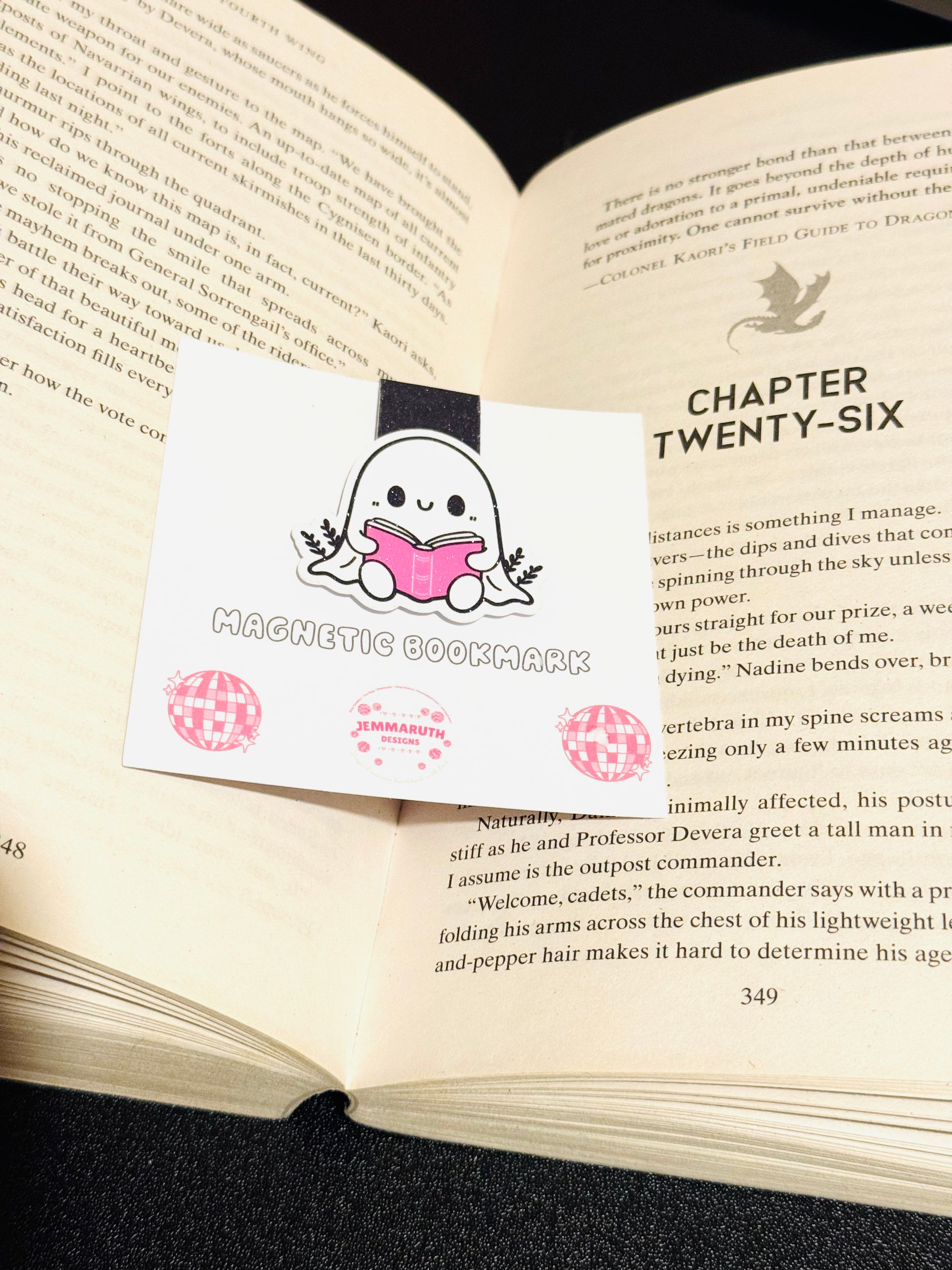 Boo Ghost magnetic Bookmark sitting on a book