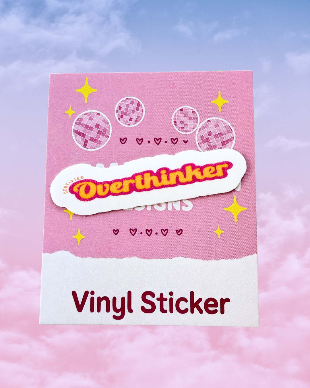 White vinyl sticker with the words certified overthinker written in yellow and pink