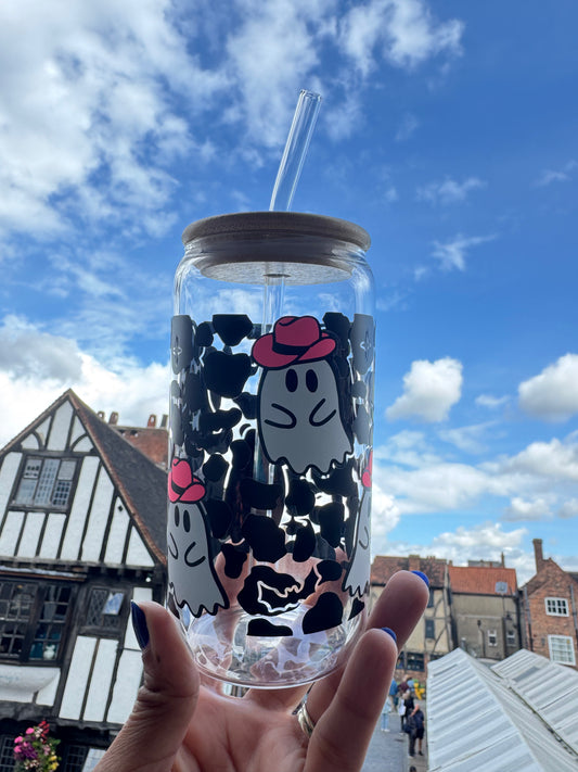 16oz glass can cup with boo ghosts wearing glow-in-the-dark pink cowboy hats, surrounded by black leopard print and bats