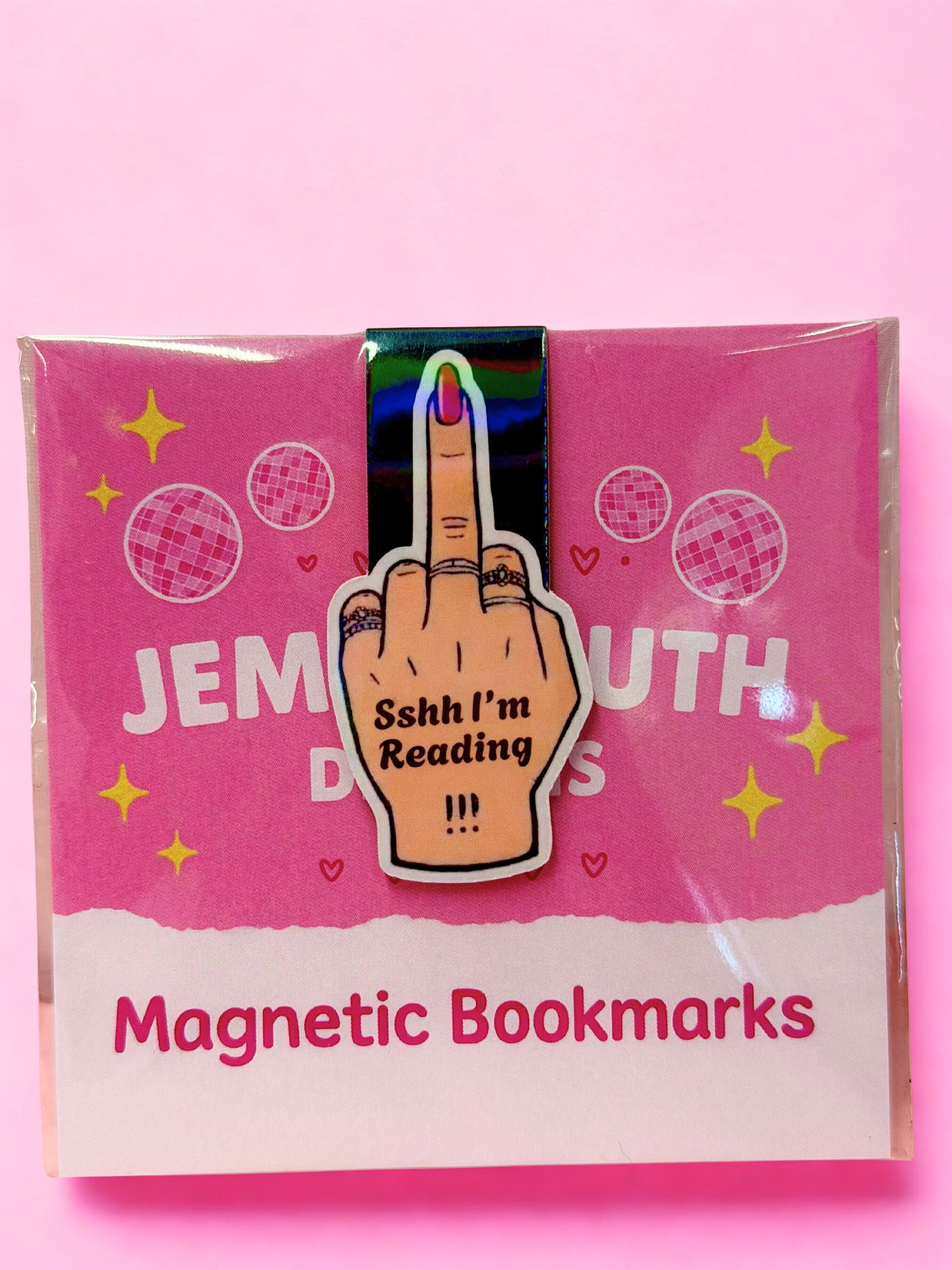 Funny “Sshh I’m Reading” magnetic bookmark with cheeky hand design on pink background