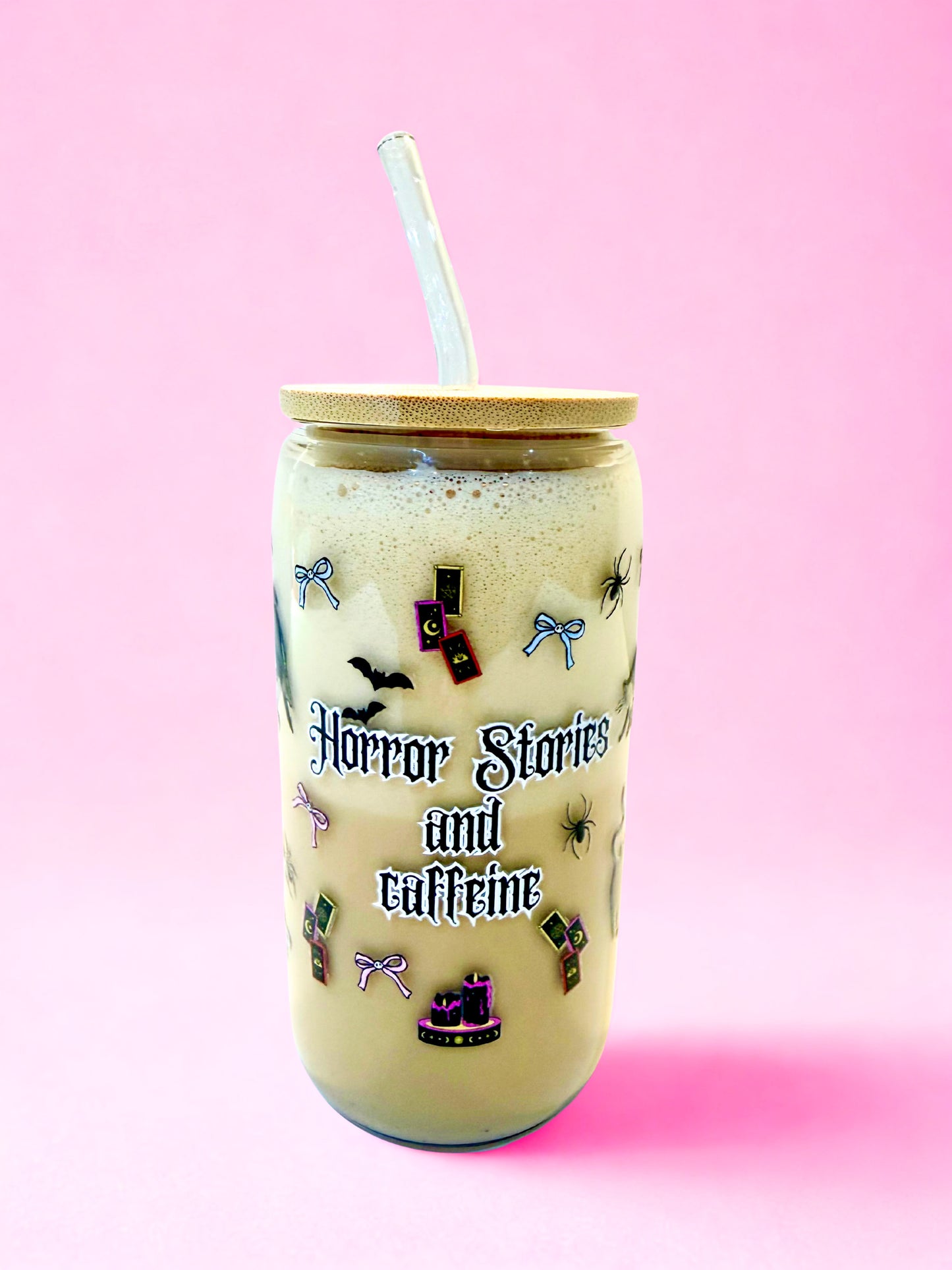 Horror Stories and Caffeine glass can cup with spooky design on pink background