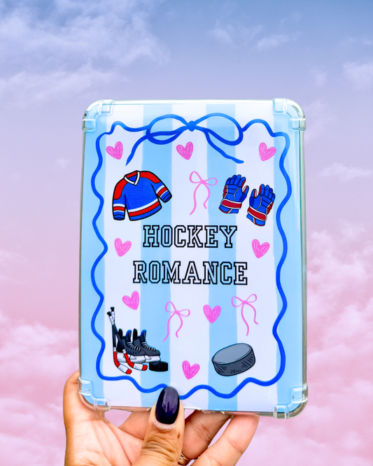 Hockey Romance Kindle insert featuring a pastel design with blue hockey sticks, hockey jerseys, gloves, a puck, pink bows and hearts.
