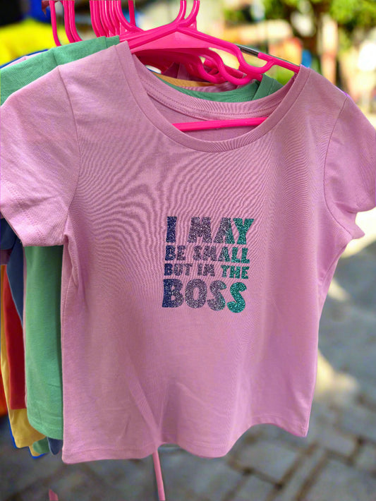 Pink Kids T-Shirt that says I May Be Small But I Am The Boss in a rainbow text