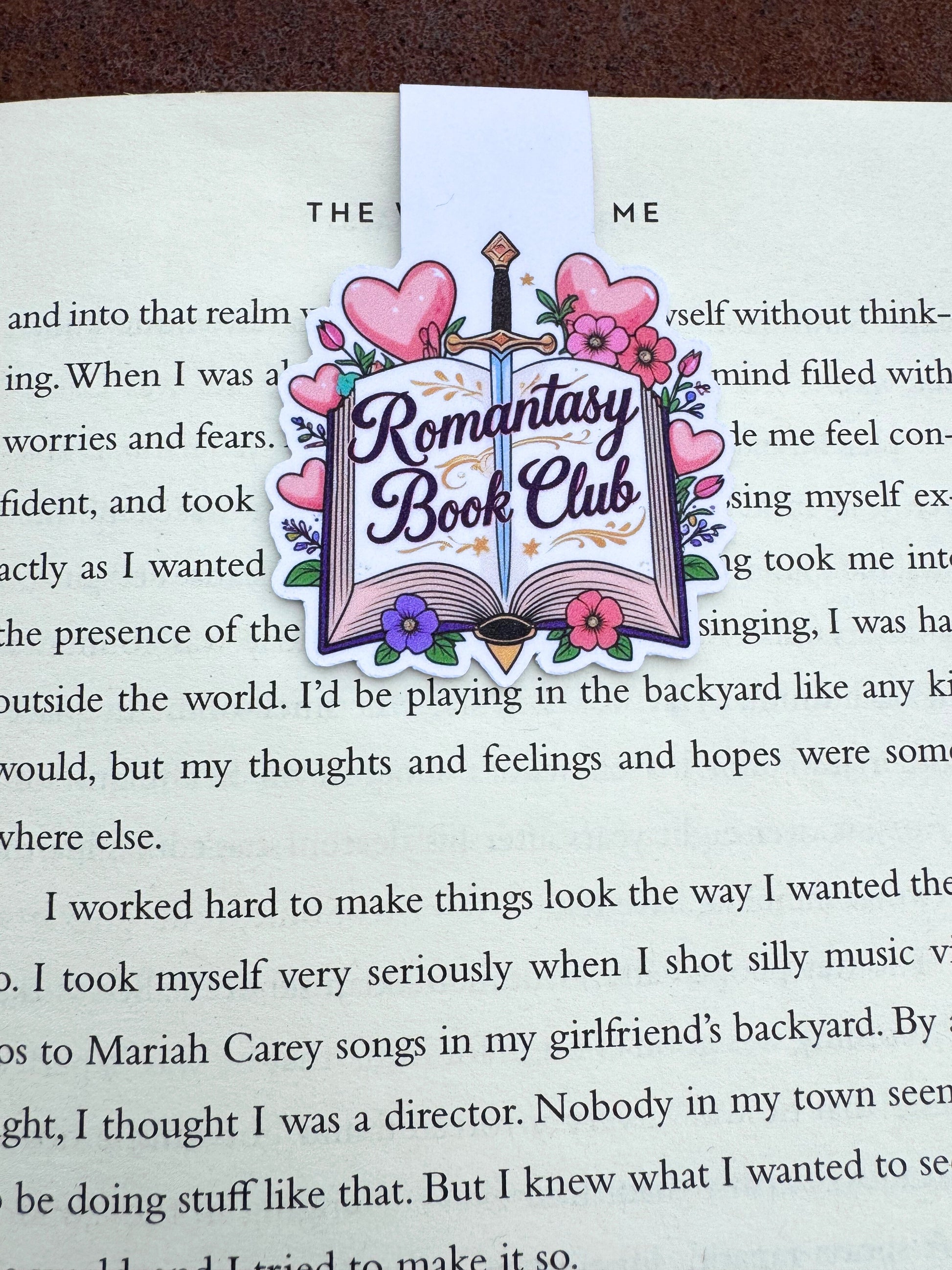 Bookmark with 'Romantasy Book Club' design on an open book