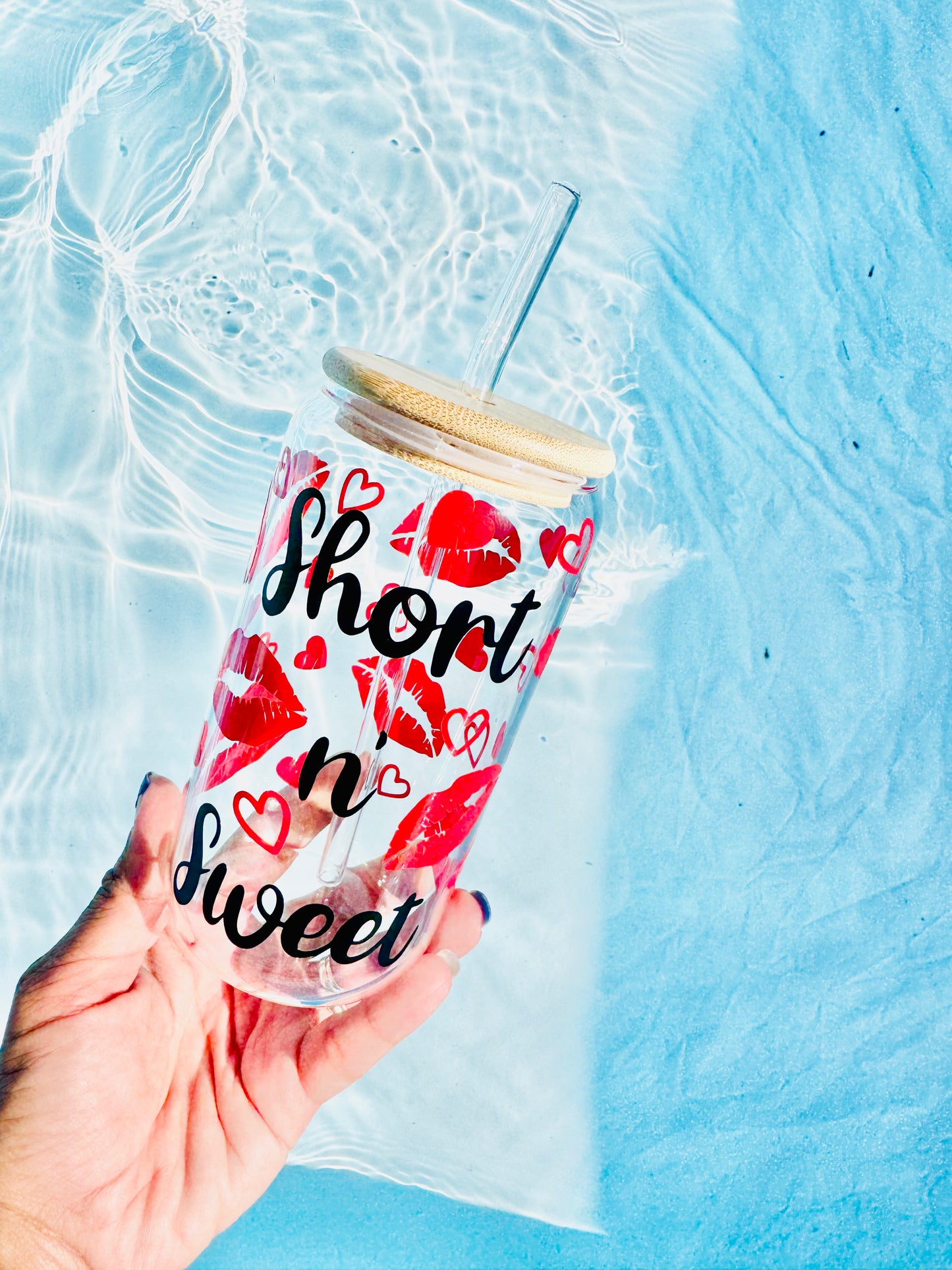 Short and Sweet glass cup with black text, red lips, and heart design – reusable tumbler with bamboo lid and straw