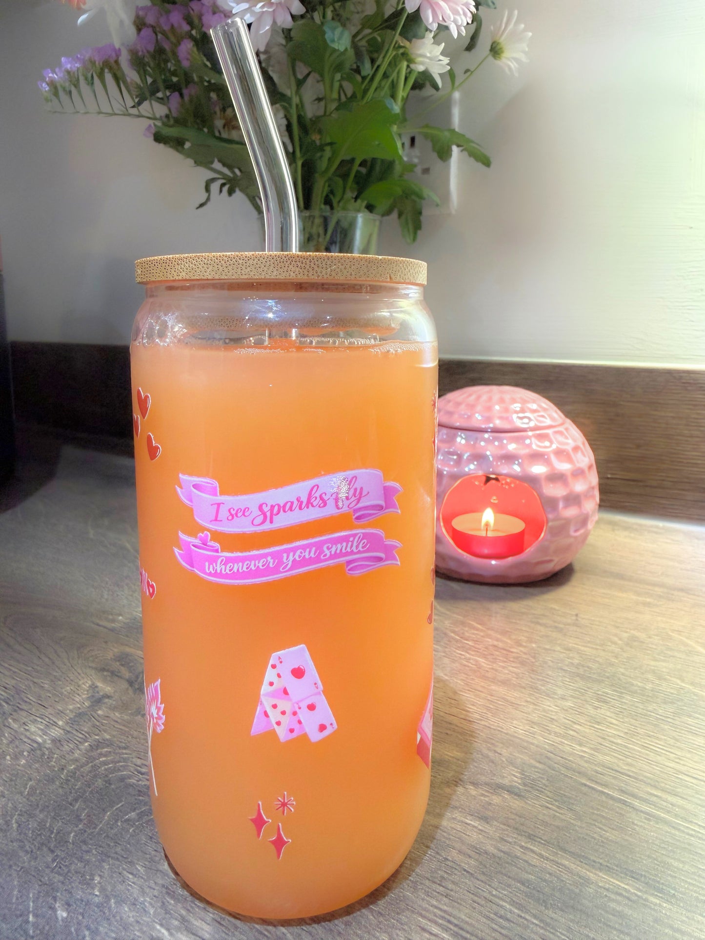 “Swiftie-inspired Valentine glass can cup with bamboo lid and glass straw, 16oz.” in a kitchen with juice inside