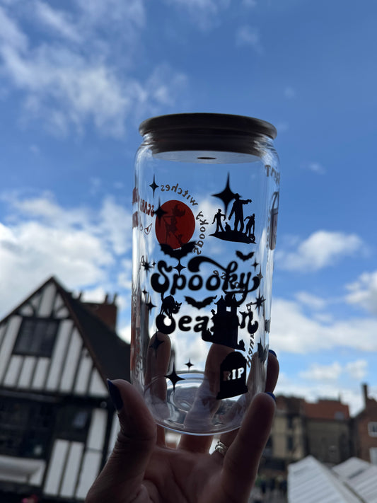 Glass Can Cup with Spooky season wording on the front, with halloween details like zombies, pumpkins, haunted house