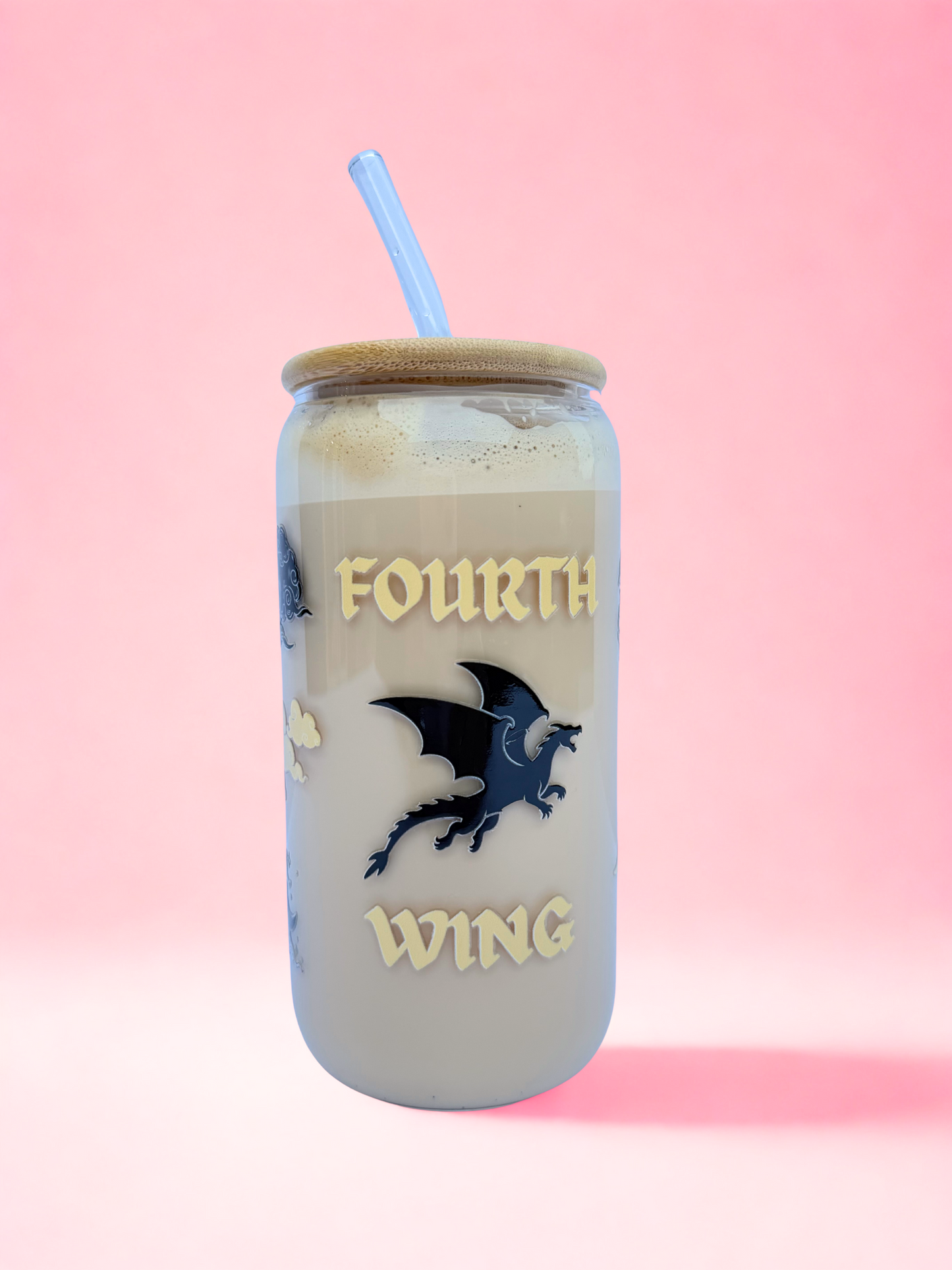 A 16oz glass with a bamboo lid and glass straw, featuring black and gold dragon and dagger designs, the words “Fourth Wing” and “Basgiath,” inspired by Violet Sorrengail and Xaden Riorson.