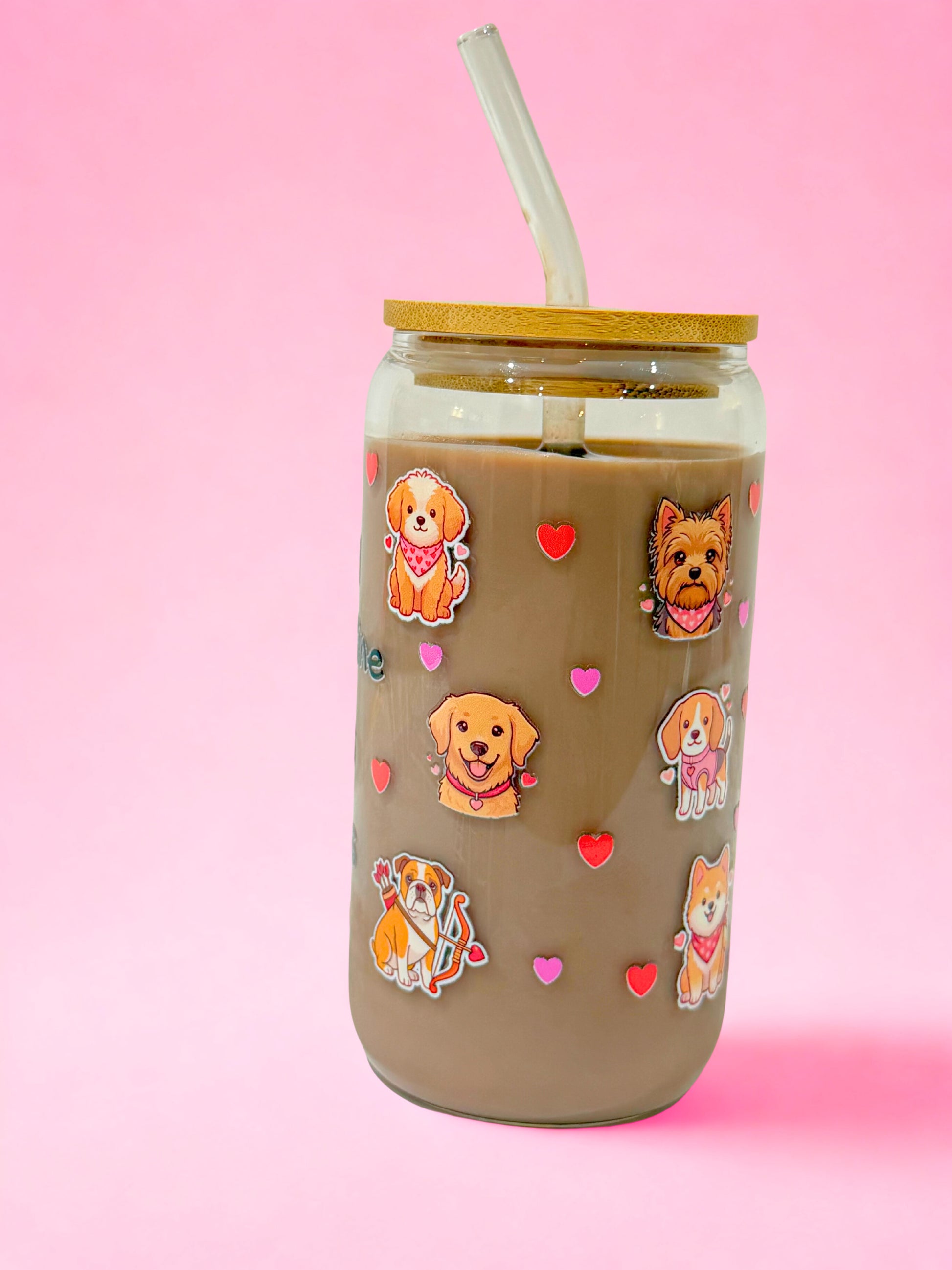 “Valentine glass can cup for dog lovers featuring multiple dog illustrations and pink heart details.”