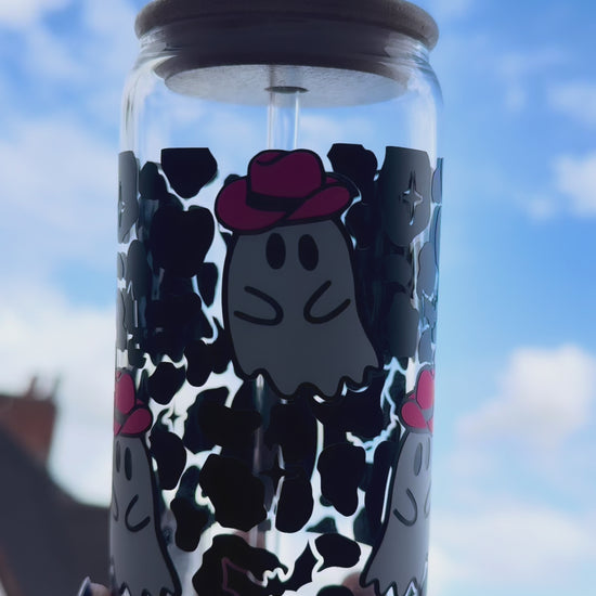 Video showing a boo ghost wearing a cowboy hat Glass Can Cup with Black bat details