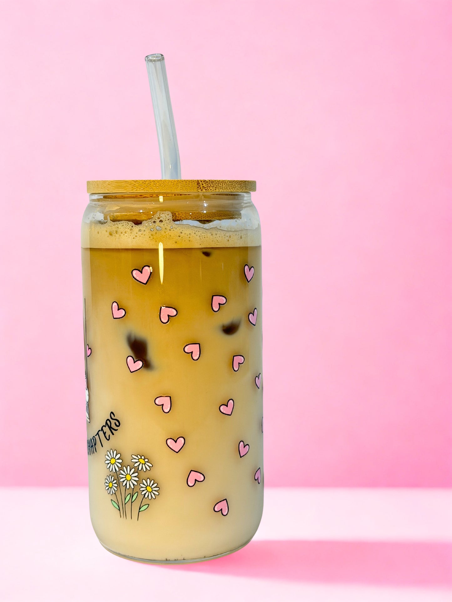 Sunshine and Chapters bookish glass can cup with cute duck reading on a swing surrounded by hearts and daisies